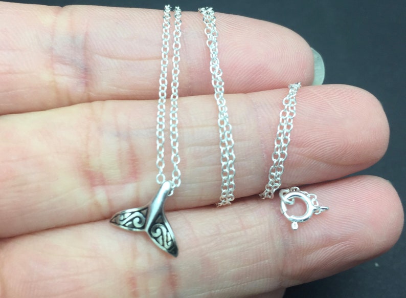 925 sterling silver chain and its 925 sterling pendant feather or whale tail