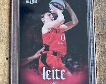 May include: A sports trading card featuring a basketball player in a red jersey with the number 0, holding a Wilson basketball above their head. The card displays the text RYAN FORS, LEITE, CARLA, FIRE, and GUARD against a dark background.