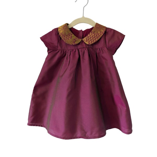 Shimmer cerise baby dress with Peter Pan sari detail collar. Perfect for Annaprashan, South Asian wedding or newborn gift