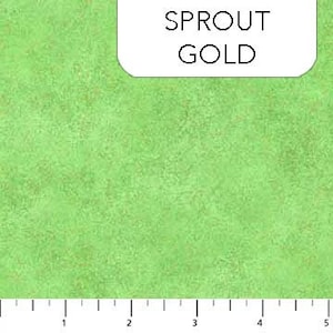 May include: A green fabric with a subtle gold fleck pattern. The fabric is called "Sprout Gold".