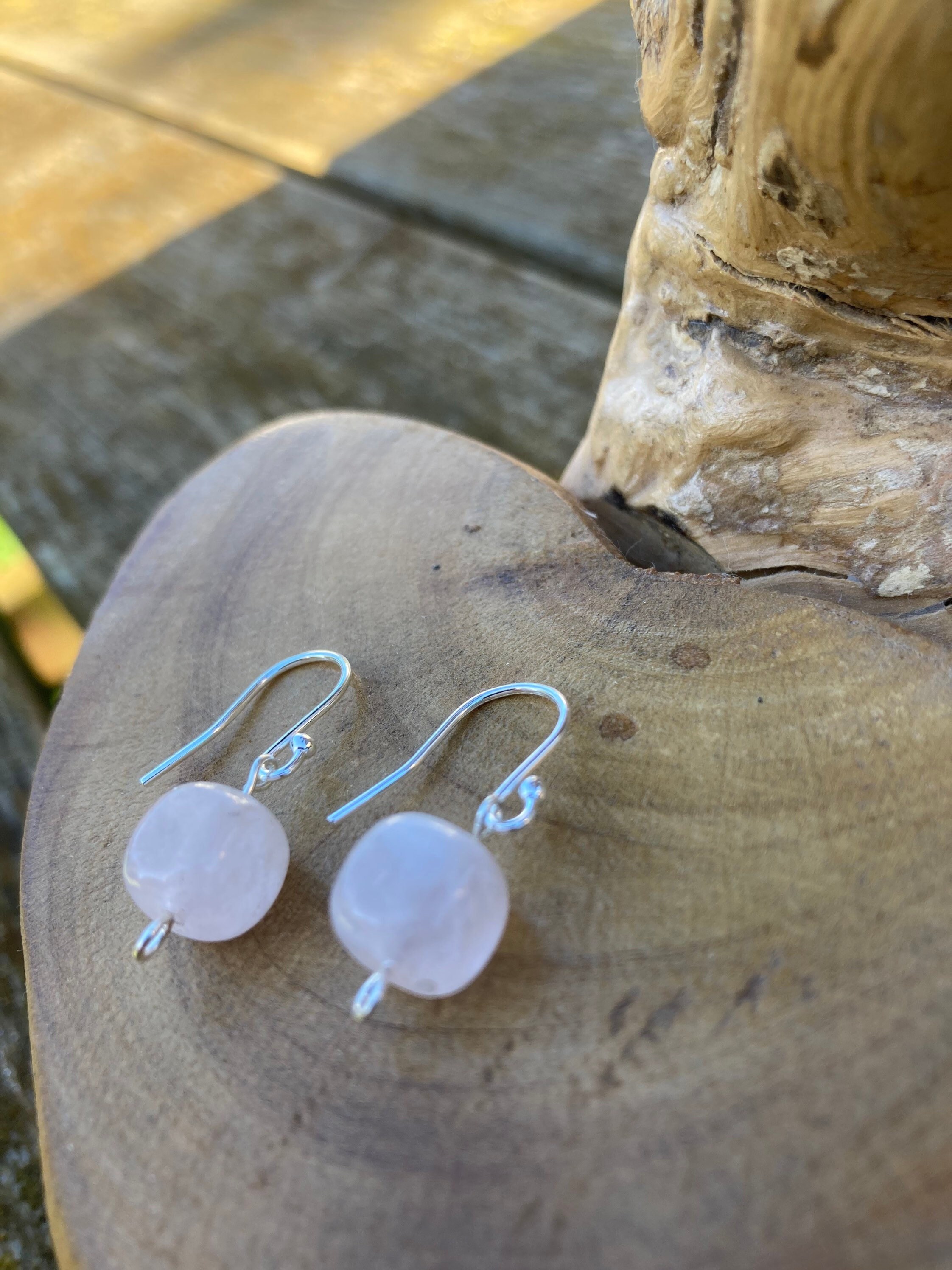 Silver rose shop drop earrings