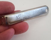 Vintage 1930s NuGrape Soda, Over The Top Trademark pop bottle opener
