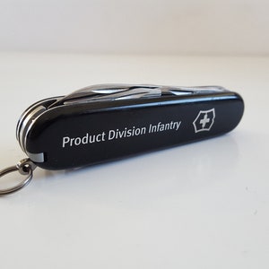 Vintage 1990&#39;s Swiss Army Officer&#39;s knife, Stainless steel, blade, phillips screwdriver, corkscrew, can opener bottle opener, advertising