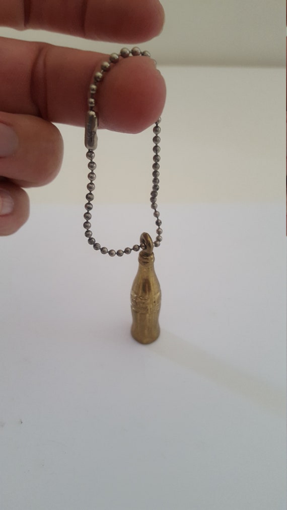 Vintage 1950's brass Coke bottle keychain on bead… - image 2