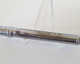 Vintage 1950's Ray-O-Vac penlight, similar to model Z-22-F with collar to turn on flashlight. clean, AA batteries included, good condition