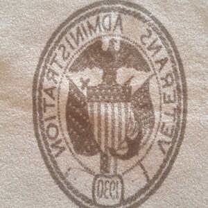 May include: A brown and white seal with the text "ADMINISTRATIVE  CIVIL SERVICE  LEAGUE  DEC. 1931" around the edge. The seal features an eagle with a shield in its talons.