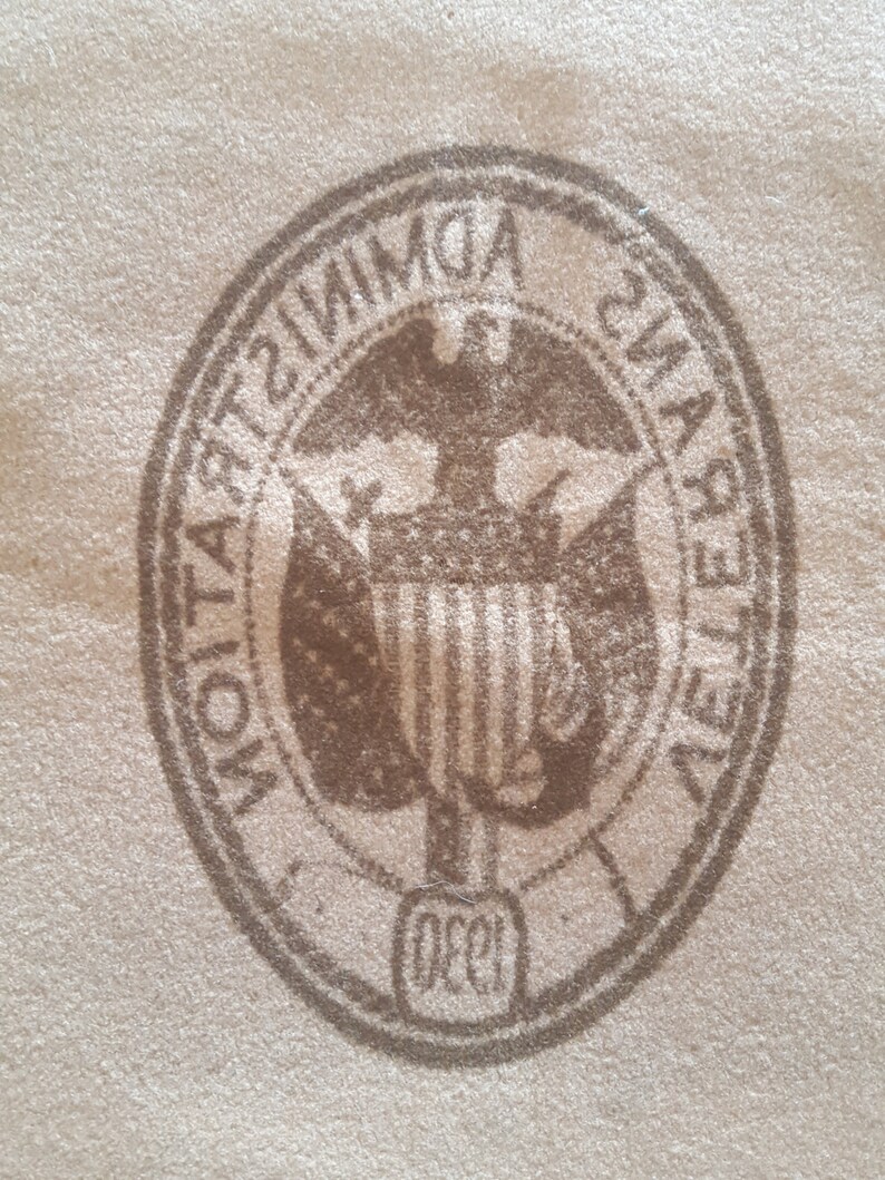 May include: A brown and white seal with the text "ADMINISTRATIVE  CIVIL SERVICE  LEAGUE  DEC. 1931" around the edge. The seal features an eagle with a shield in its talons.