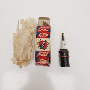 Vintage 1950&#39;s pair of Electro Spark Spark Plug original box in good condition that has been conserved.
