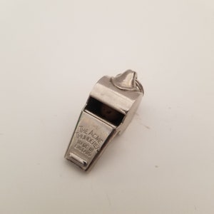 Vintage Acme Thunderer Whistle, Made in England good condition with bail. Same maker of whistles used by Officers on RMS Titanic