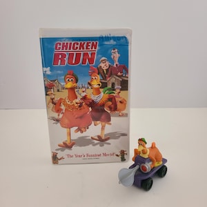 Vintage 2000 VHS cassette of Chicken Run, includes a Burger Kings kids meal toy of Ginger both in good condition