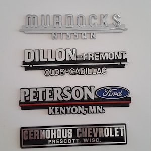 Pick One Vintage 1980&#39;s old stock Car Dealership badges, adhesive back metal/plastic Olds Cadillac, Ford, Chevrolet
