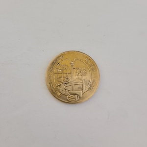Vintage 1962 Seattle World&#39;s Exposition Century 21 polished brass &quot;so called dollar&quot; Space Needle Space Age World&#39;s Fair