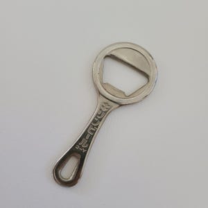 Vintage circa 1970's cast metal advertising bottle opener Kirin Beer, Imported from Japan good condition