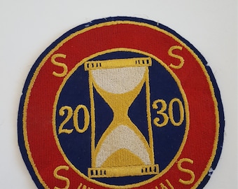 Écusson sablier « 4 S International » vintage des années 1950