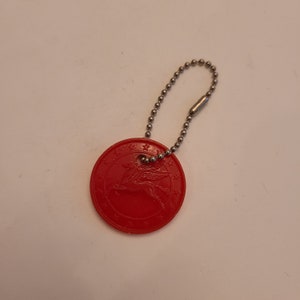Vintage Mobil Oil Winged Pegasus key ring fob, molded plastic red on a bubble chain, double sided 1 1/4"