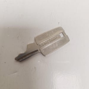 Vintage 1970's Samsonite Silhouette luggage key fits No.69 in good condition