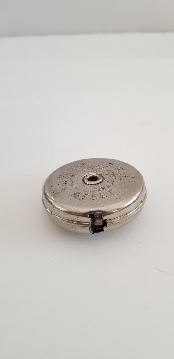 Vintage metal 2024 tape measure