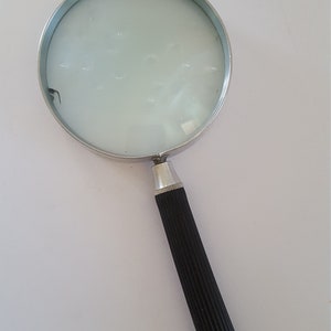 Vintage late 1970&#39;s &quot;Private Eye&quot; magnifying glass marked Made in USA 3 1/2&quot; glass nice and clean with no scratches but a chip unknown power