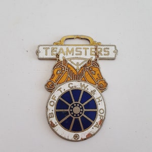 Vintage circa 1950&#39;s enamel pocket watch fob features Teamster Logo, likely a safety award possibly from Roadway Express