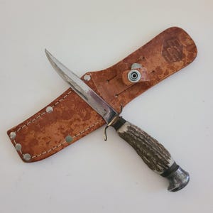 Vintage 1950&#39;s to 1960&#39;s Solingen Cutlery B.Svoboda sheath knife, Made in Solingen Germany  embossed leather sheath not original, good blade