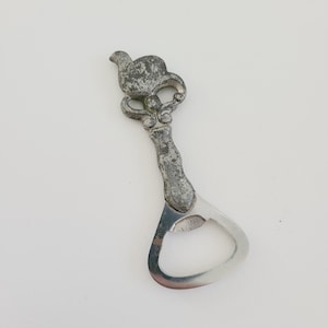 Vintage circa 1960's cast metal figural  bird bottle opener, used condition, unmarked