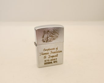 Vintage circa 1960's advertising cigarette lighter advertising Thomas Insulation & Drywall Sheridan, WY