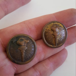 Vintage circa 1930&#39;s ROTC bronze collar discs one with a thumb screw the other without