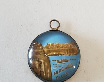 Antique pendant Niagara Falls NY, glass and brass item in great condition, no maker mark just Made in Germany 1 3/16" without bail