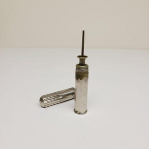 Antique circa 1890 &quot;Cushman & Denison&quot;, pinpoint oiler watchmaker or firearms use one drop at a time. good condition with some nickel loss