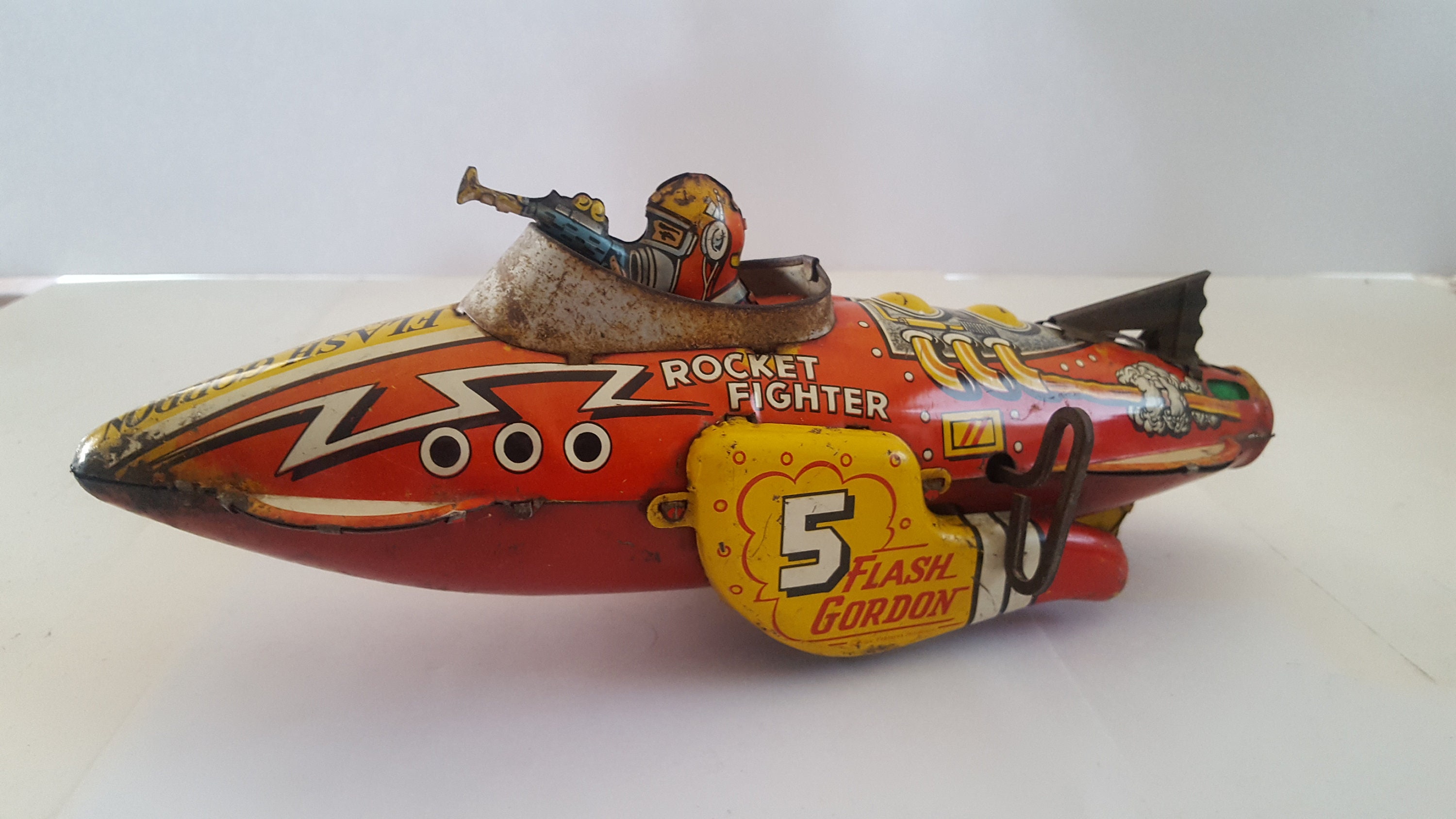 Vintage circa 1939 clockwork key steel toy Flash Gordon No.5