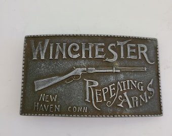 Vintage circa 1970's reproduction cast belt buckle Winchester Repeating Arms New Haven Conn, used by permission lightly cleaned