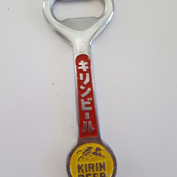 Vintage 1960's Kirin Beer large bottle opener, cast metal measures 6 3/8" red and yellow paint is original, double sided