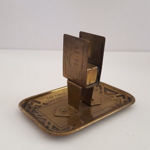 Antique circa 1913 brass advertising ashtray and match holder Forest City Life Insurance Co Rockford, Illinois