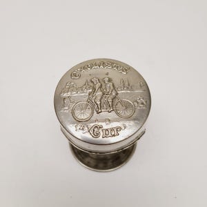 Antique circa 1910&#39;s Cyclist&#39;s Cup. Silver plated collapsible cup, hallmarked good condition debossed lid great image patented 1897, brass