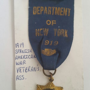 Antique Spanish American War Veterans Convention Delegate badge from Department of New York, 1919, Gilded