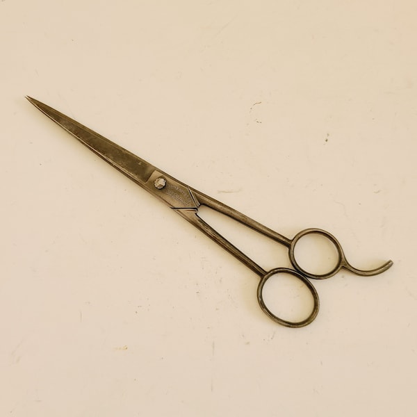 Antique pair of barber scissors marked Kleeblatt B.S. ( Barber Supply) Co Sioux City Iowa, vanadium probably dates to 1920's