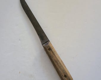 Vintage late 1940&#39;s to 1950&#39;s Forgecraft Ontario Knife Co butcher knife, well worn handle with brass pins and forged carbon steel blade.