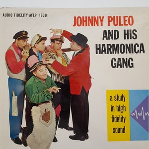 Vintage circa 1957 vinyl album Johnny Puleo and his Harmonica Gang, excellent condition jacket and vinyl