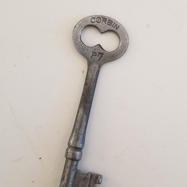 Antique circa 1900 P.&F. Corbin New Britain CT  lock key, cast steel marked P7