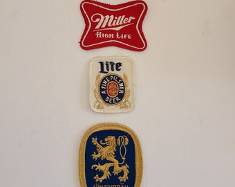 Vintage lot of 3 embroidered patches salvaged from a beer distributor jacket, Miller High Life, Lowenbrau, Miller Lite, good condition