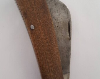 Vintage pre-1973 Schrade-Walden 136 hawkbill pruner, cocobolo wood scales with a metal bail, used but sharp.