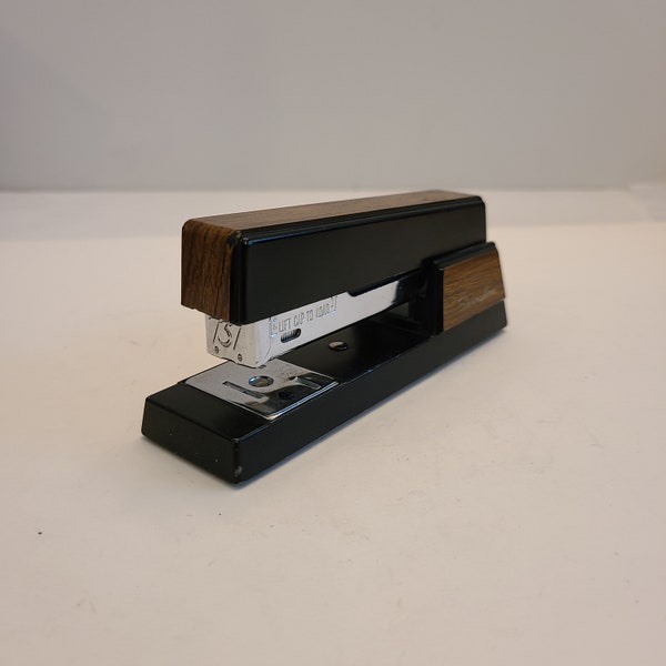 Vintage mid-1970's Swingline No.737 small size stapler, nice condition with faux woodgrain, very 70's