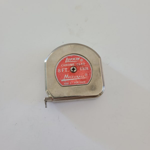Vintage Lufkin Mezurall No C928 8ft steel tape measure,  worn but legible label, 1940's