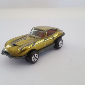 Vintage circa 1969 1st year Johnny Lightning Topper Custom XKE Jaguar, gold