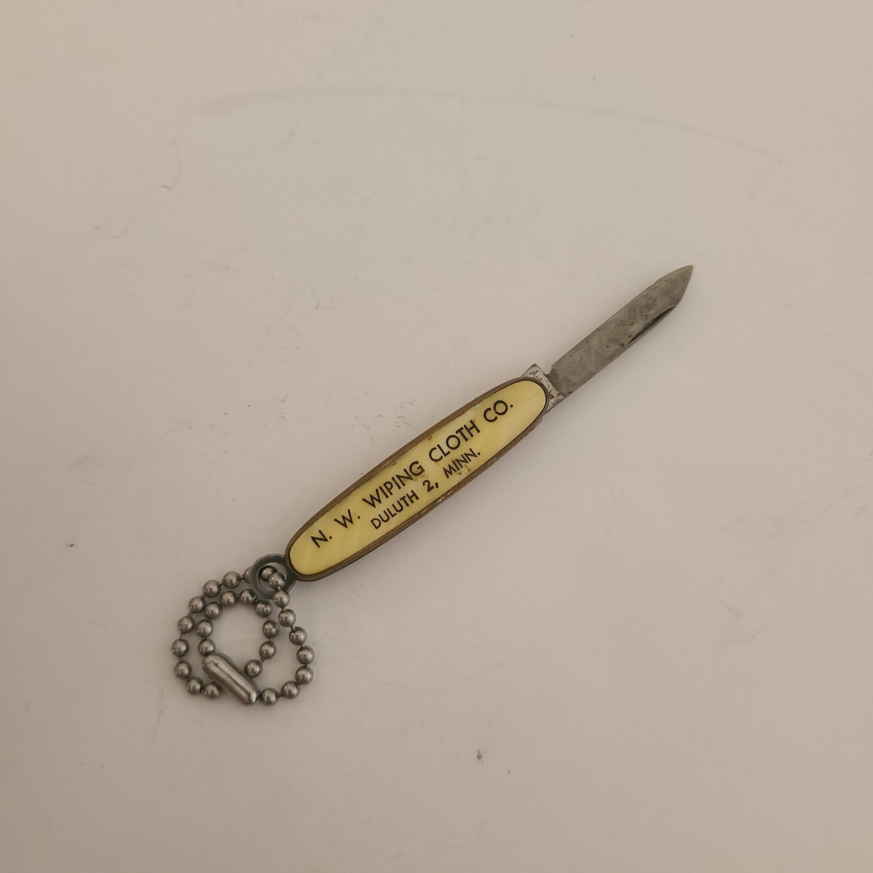 Vintage Advertising Keychain Knife: M.W. Wiping Cloth, Duluth 