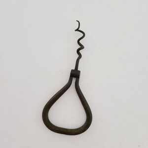 Antique possibly German unknown maker folding corkscrew,  nice sharp screw with a bit of a bend to the screw, barware cork puller, 5 3/8&quot;