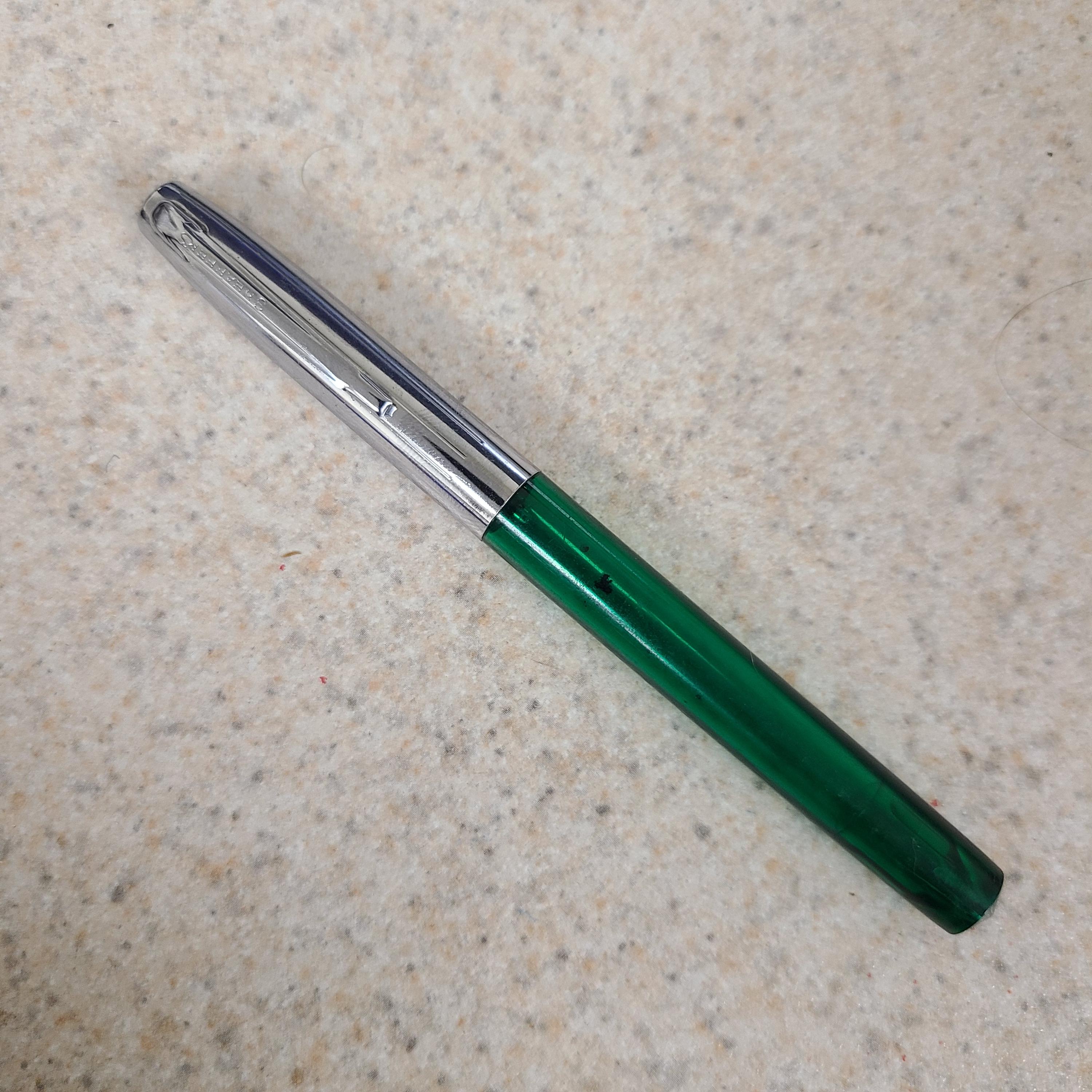 Vintage Sheaffer's fountain pen, silver/chrome cap with green shaft, cartridge type. Measures 4 7/8" 1 M or 1 F choose