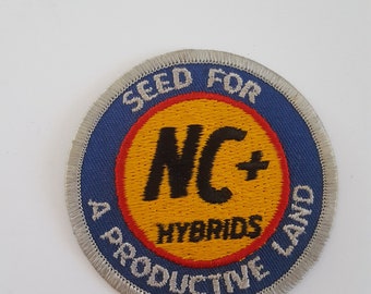 Vintage circa 1980's NC+ Hybrids Seed company patch " Seed for a Productive Land" good condition