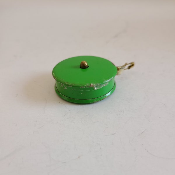 Vintage 1950's mid Century pocketbook cloth measuring tape, Made in USA,  automatic retraction, 48" Kelly green metal case safety pin stop