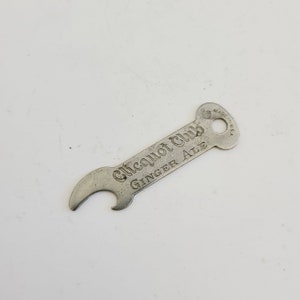 Chicken Feather with Claw Pop Cap Bottle Opener Chicken Feather with Claw Pop Cap Bottle Opener